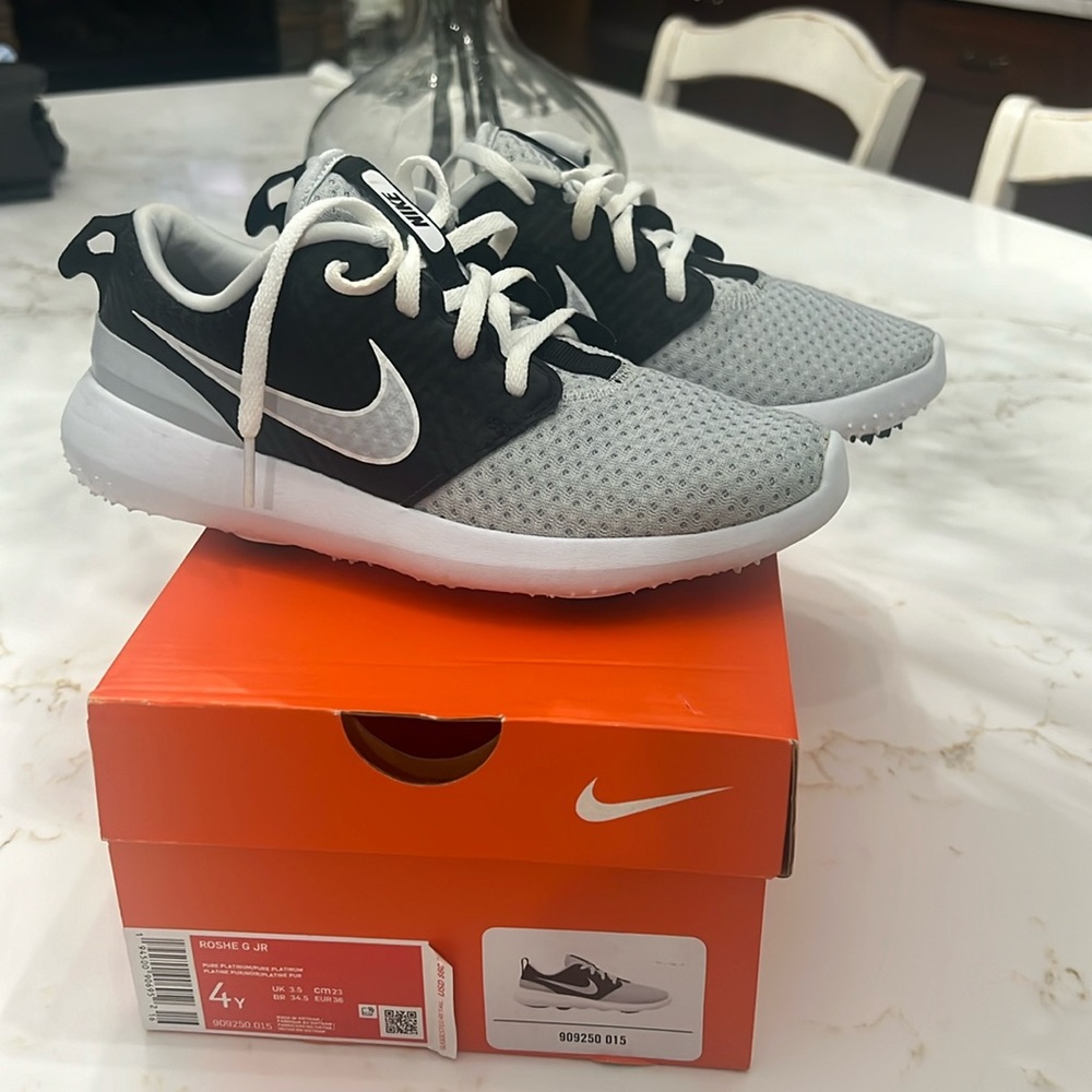 Boys size 4 Nike Golf shoes. Great condition.